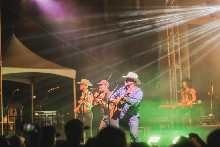 A band is performing live on stage